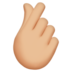 Hand With Index Finger And Thumb Crossed: Medium-light Skin Tone Emoji Copy Paste ― 🫰🏼 - apple