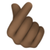 Hand With Index Finger And Thumb Crossed: Dark Skin Tone Emoji Copy Paste ― 🫰🏿 - facebook