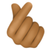 Hand With Index Finger And Thumb Crossed: Medium-dark Skin Tone Emoji Copy Paste ― 🫰🏾 - facebook