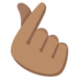 Hand With Index Finger And Thumb Crossed: Medium Skin Tone Emoji Copy Paste ― 🫰🏽 - google-android