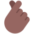 Hand With Index Finger And Thumb Crossed: Medium-dark Skin Tone Emoji Copy Paste ― 🫰🏾 - microsoft